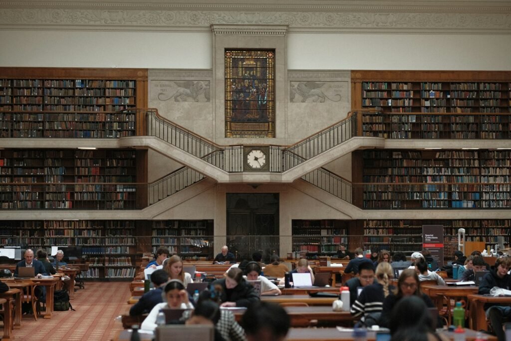 A university library with bookshelves and study spaces